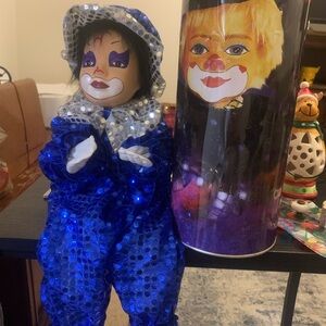 Lucy’s shelf sitting clown doll & housing tin porcelain face sits 17” high